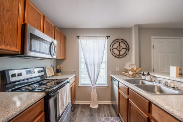 Model unit kitchen with high end appliances in Elevate Apartments Tallahassee, FL