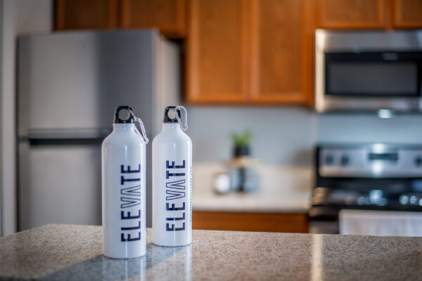 Water bottle with Elevate Apartments logo